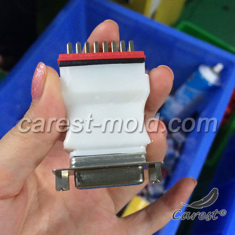 Automotive test connector overmoulding