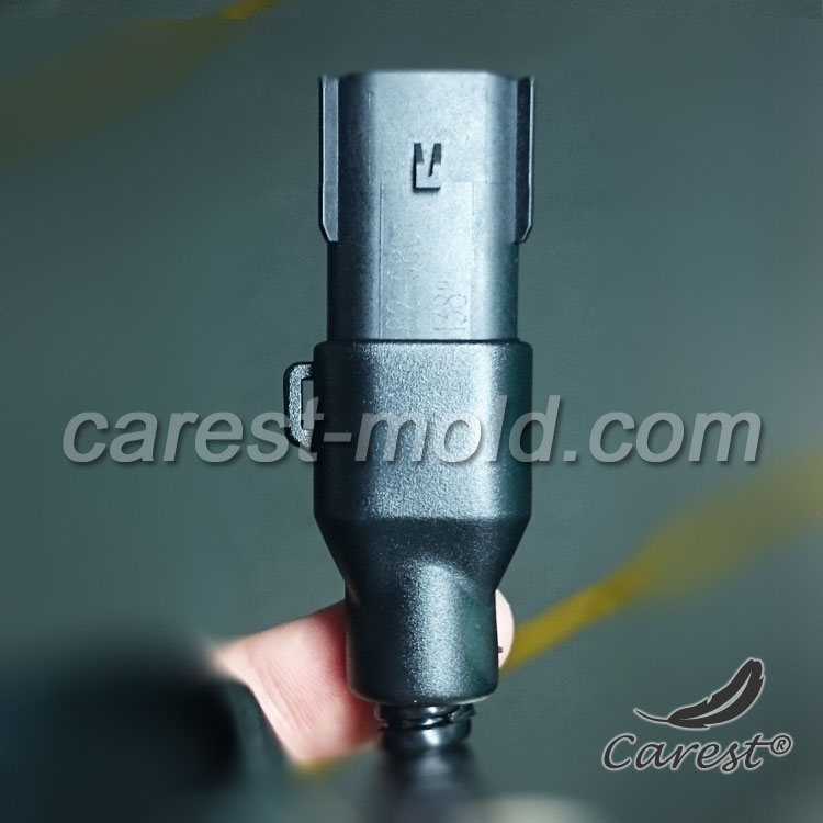 Waterproof connector with metal shield PVC overmoulding