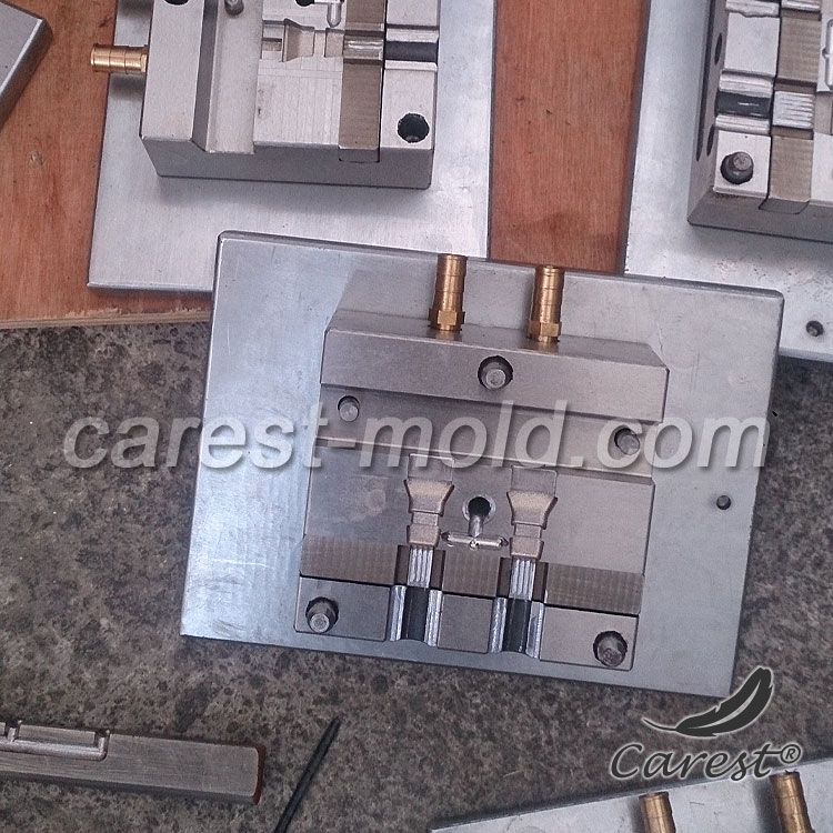 Small mould for PVC cable overmoulding